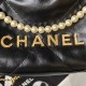 CHANEL 22 MINI HANDBAG Shiny Grained Calfskin, Gold-Tone & Pearl Black AS3980