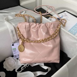 CHANEL 22 MINI HANDBAG Calfskin, Gold-Tone Pink AS3980