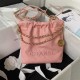 CHANEL 22 MINI HANDBAG Shiny Grained Calfskin, Gold-Tone & Lacquered Pink AS3980