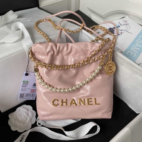 CHANEL 22 MINI HANDBAG Shiny Grained Calfskin, Gold-Tone & Pearl Pink AS3980