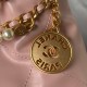 CHANEL 22 MINI HANDBAG Shiny Grained Calfskin, Gold-Tone & Pearl Pink AS3980