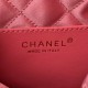 CHANEL 22 MINI HANDBAG Shiny Grained Calfskin, Gold-Tone & Lacquered Coral Pink AS3980