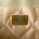 CHANEL 22 MINI HANDBAG Calfskin, Gold-Tone Yellow AS3980