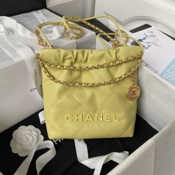 CHANEL 22 MINI HANDBAG Shiny Grained Calfskin, Gold-Tone & Lacquered Yellow AS3980