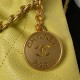 CHANEL 22 MINI HANDBAG Shiny Grained Calfskin, Gold-Tone & Lacquered Yellow AS3980