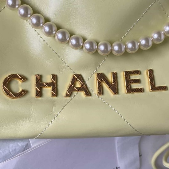 CHANEL 22 MINI HANDBAG Shiny Grained Calfskin, Gold-Tone & Pearl Yellow AS3980